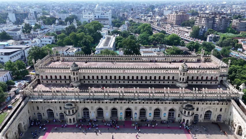 Drone shot of Bara Imambara and Rumi Gate in Lucknow with Gomti River and city skyline