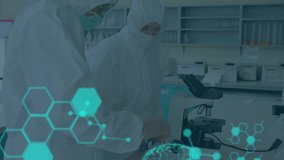 Animation of scientific data processing and human brains over scientists in ppe suits in laboratory. global science, research and data processing concept digitally generated video. - Powered by Shutterstock - Get 15% off with code: PIKWIZARD15