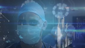 Animation of network of connections over african american male surgeon in face mask. Health, medicine, connections, network and technology concept digitally generated video. - Powered by Shutterstock - Get 15% off with code: PIKWIZARD15
