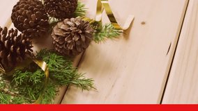 Animation of snow falling over pine cones. Christmas, celebration and digital interface concept digitally generated video. - Powered by Shutterstock - Get 15% off with code: PIKWIZARD15