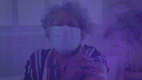 Masked woman wearing glasses analyzing data with animated bar charts line graphs waveforms. Technology, analytics, futurism, digital, data visualization, intelligence, innovation - Powered by Shutterstock - Get 15% off with code: PIKWIZARD15