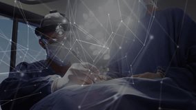 Animation of network of connections over diverse surgeons during surgery. global medicine and digital interface concept digitally generated video. - Powered by Shutterstock - Get 15% off with code: PIKWIZARD15