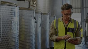 Animation of data processing over caucasian male worker using tablet. Global business and digital interface concept digitally generated video. - Powered by Shutterstock - Get 15% off with code: PIKWIZARD15