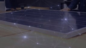 Animation of network of connections over caucasian engineer by solar panel. Global sustainability, eco solar energy and networks concept digitally generated video. - Powered by Shutterstock - Get 15% off with code: PIKWIZARD15