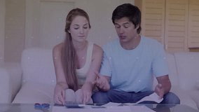 Overlay appearing, couple examining finances and man gesturing financial graph offering comfort. Collaboration, analysis, planning, teamwork, modern, consultation, harmony - Powered by Shutterstock - Get 15% off with code: PIKWIZARD15