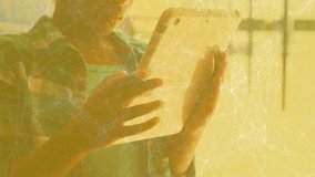 Animation of network of connections over mid section of african american boy using digital tablet. Global networking and education technology concept - Powered by Shutterstock - Get 15% off with code: PIKWIZARD15