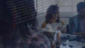Animation statistics and financial data processing over business people using electronic devices. Global business, finance and data processing concept digitally generated video. - Powered by Shutterstock - Get 15% off with code: PIKWIZARD15
