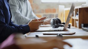 Woman tapping smartphone on desk and emitting user icons linking to laptop mapping digital network. Collaboration, connectivity, technology, communication, modern, productivity, innovation - Powered by Shutterstock - Get 15% off with code: PIKWIZARD15