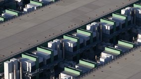 Aerial view of the AI Data Center, displaying rows of white and green structures in a symmetrical layout, highlighting the center's vast scale, Middenmeer, Netherlands. - Powered by Shutterstock - Get 15% off with code: PIKWIZARD15