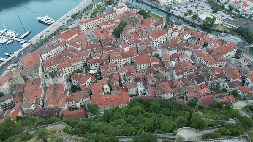 Kotor Old Town is a historic center on the Adriatic with narrow streets, ancient architecture, and a fortress. Surrounded by walls, it offers stunning views of the bay and rich cultural heritage.