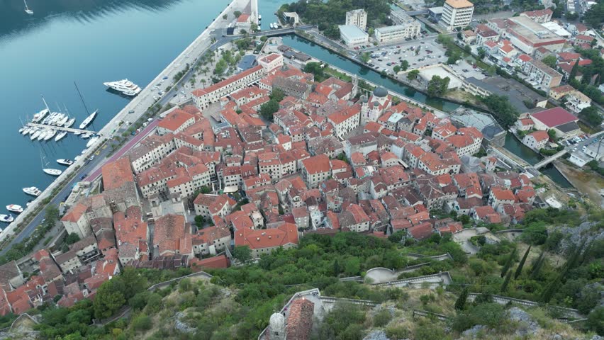 Kotor Old Town is a historic center on the Adriatic with narrow streets, ancient architecture, and a fortress. Surrounded by walls, it offers stunning views of the bay and rich cultural heritage.