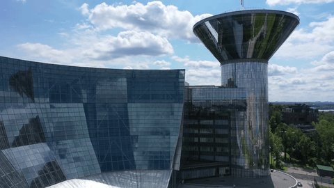 Drone Rotating toward Office Complex Ascending