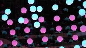 Pink glowing spheres creating a vibrant abstract light installation - Powered by Shutterstock - Get 15% off with code: PIKWIZARD15