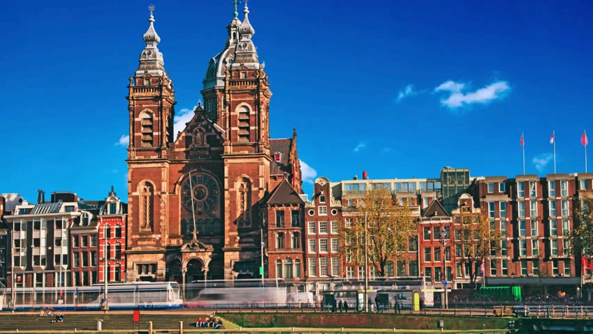 Saint Nicholas church in the historic center of the Amsterdam, The Netherlands on a sunny dayHyperlapse of the Basilica of Saint Nicholas in Amsterdam