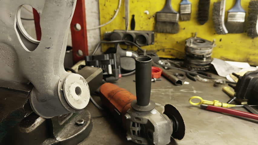 Car Front Lower Arm Bush Repair at the Repair Shop Footage.