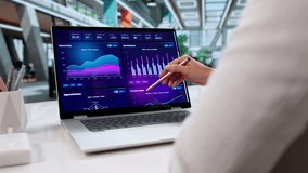 Financial Data Analyst Creating Marketing KPI Dashboard On Laptop. - Powered by Shutterstock - Get 15% off with code: PIKWIZARD15