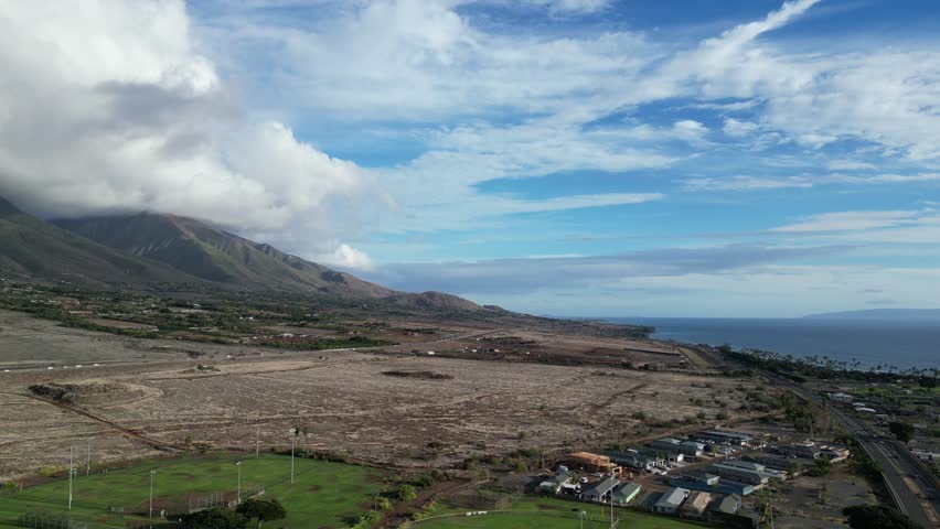 west maui mountains in lahaina hawaii (tropical pacific island territory) scenic view bare hills green mountain landscape aerial view clouds moving usa last state united states of america forest