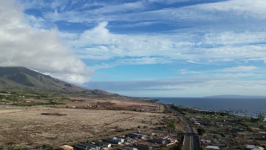 west maui mountains in lahaina hawaii (tropical pacific island territory) scenic view bare hills green mountain landscape aerial view clouds moving usa last state united states of america forest