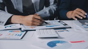 Financial meeting, infographic and closeup of business people and team doing statistics analysis with documents and graphs. Accountants consulting on data, budget and profit charts for company - Powered by Shutterstock - Get 15% off with code: PIKWIZARD15