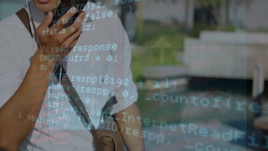 A man is talking on a mobile phone outside. Financial data is being processed and recorded in the background.