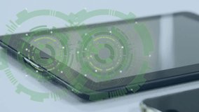 Animation of data processing over smartphone and tablet. Global business, computing, connections and data processing concept digitally generated video. - Powered by Shutterstock - Get 15% off with code: PIKWIZARD15