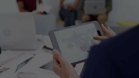 Presenter touching tablet initiating grid overlay and animating graphs for live business insights. Analytics, data visualization, business strategy, teamwork, digital, modern, corporate - Powered by Shutterstock - Get 15% off with code: PIKWIZARD15