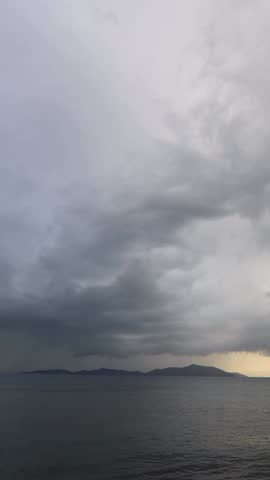 storm clouds over the sea. Turgutreis, Bodrum, Turkey. Vertical video for social media.
