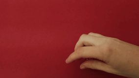 Throwing the dice. Red cubes with white dots on red background. Playing board games, gambling, winning or loosing in the casino. Slow motion closeup video. - Powered by Shutterstock - Get 15% off with code: PIKWIZARD15