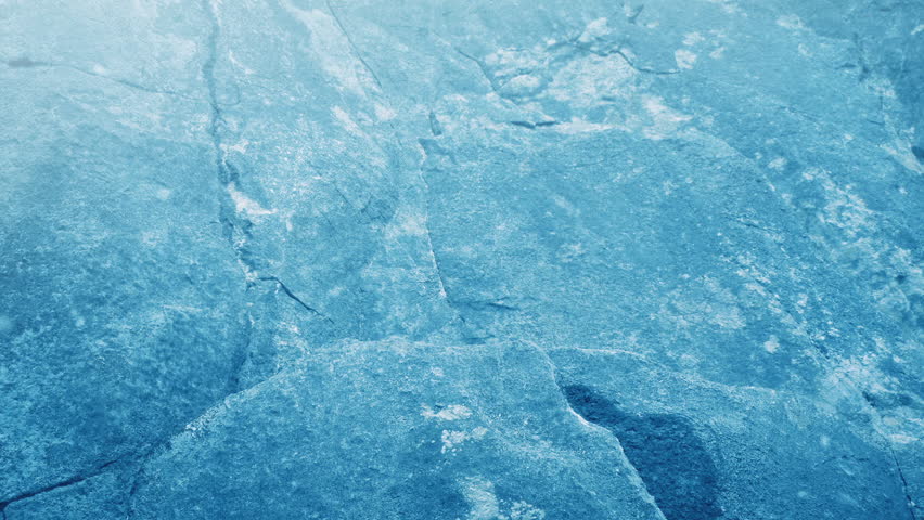 Climbing Axe Gets Hold On Rocks In Snowfall