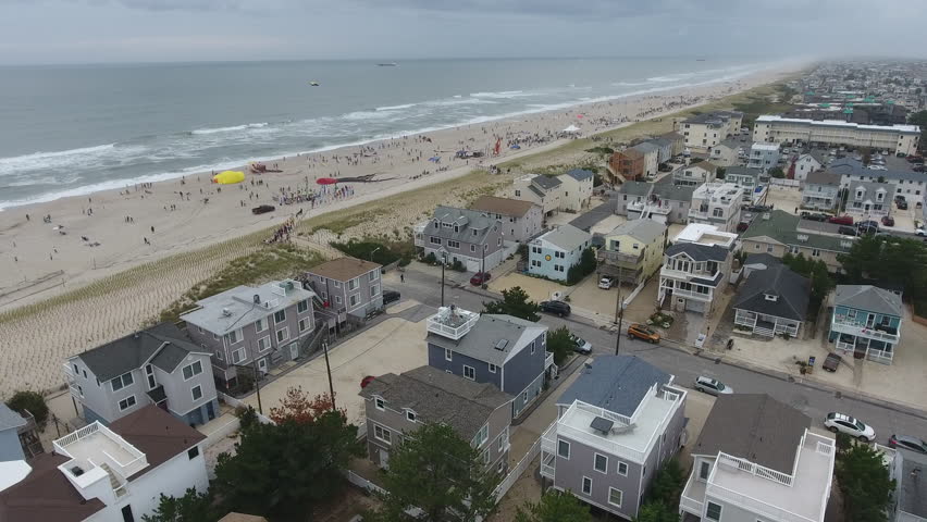 Aerial view of beach full of people, on Long Beach Island.