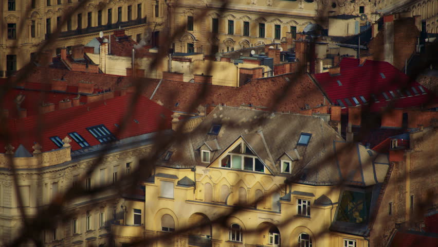 Dense urban rooftops in Budapest showing historic architecture and city layout.