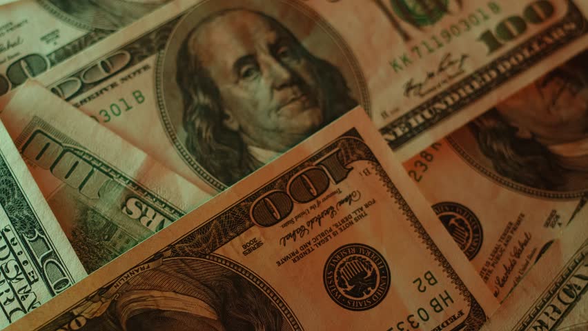 Hundred dollar bills close up. Cash money background. 