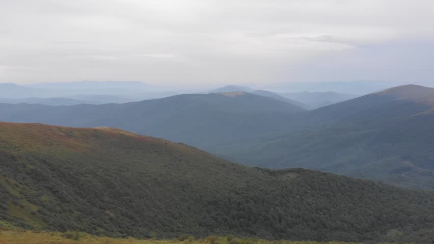 Green mountain forest valley after or before rain in beautiful Ukrainian mountains. Travel Ukraine. Drone view