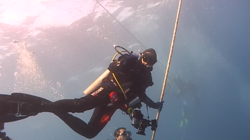 A Diver making a saftey stop on a mooring line. Captured on a 3CCD DVCAM Camera 16:9 anamorphic