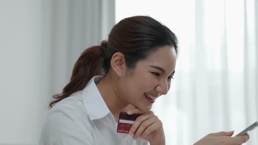 Woman shopping or pay online on internet marketplace browsing for sale items for modern lifestyle and use credit card for online payment from wallet protected by vivancy cyber security software