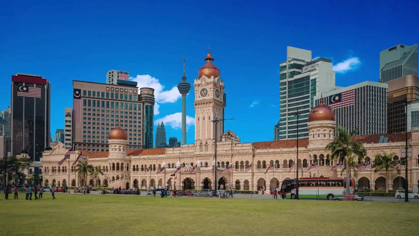 National Textile Museum located at Kuala Lumpur in Malaysia. Translation: "National Textile Museum"Sultan Abdul Samad Building in Kuala Lumpur, Malaysia.Merdeka Square in downtown Kuala Lumpur MalaysiaKuala Lumpur ,   Malaysia A landscape of the historical Sultan Abdul Samad building on a cloudy dayskyscraper, brick, destination, metropolis, court, islamic,  , buildings, blue, islam, central, government, freedom, famous, malaysian, culture, arch, landscape, capital, travel, sultan, urban, asia, kl, architecture, malaysia, tourism, exterior, city, samad, abdul, square, history, clock, heritage, merdeka, tower, landmark, cityscape, colonial, building, historical, asian, historic, street, dome, kuala downtown, independence