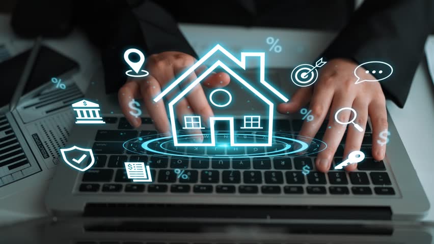 Digital Home Buying Concepts with Hands on Laptop Creating House Icons, Financial Symbols, and Real Estate Icons in a Modern Business Setting Gluon.