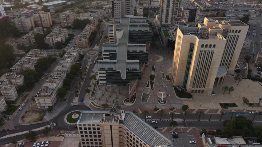 Aerial Sunrise Over Central Beersheba Skyline, Israe, Urban Cityscape at Dawn
