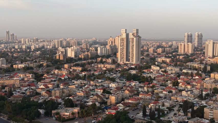 Aerial Sunrise Over Central Beersheba Skyline, Israe, Urban Cityscape at Dawn