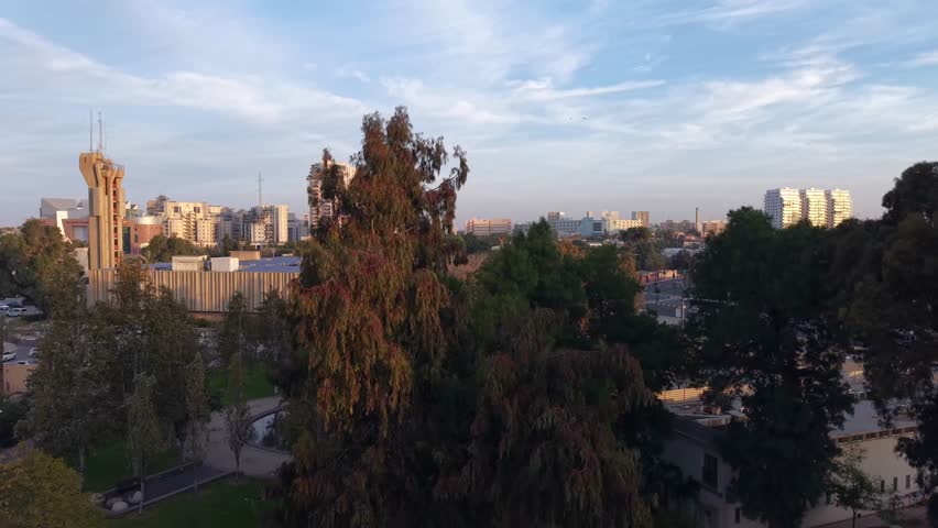 Aerial Sunrise Over Central Beersheba Skyline, Israe, Urban Cityscape at Dawn