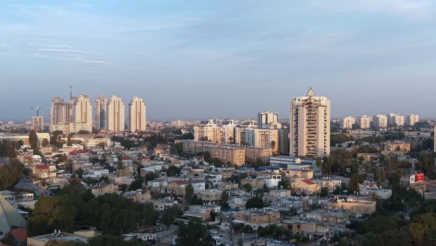 Aerial Sunrise Over Central Beersheba Skyline, Israe, Urban Cityscape at Dawn