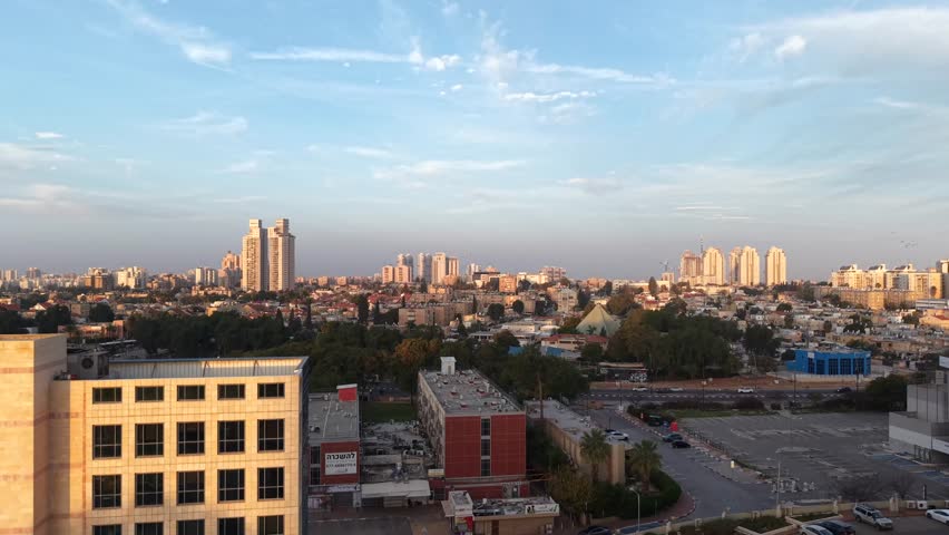 Aerial Sunrise Over Central Beersheba Skyline, Israe, Urban Cityscape at Dawn
