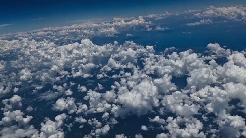 Flying Above the Clouds Over the Ocean, Serene Sky Background
