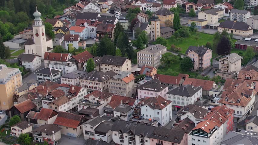 A Panoramic aerial view of the old town around the city Thusis in Switzerland on a cloudy day in summer
