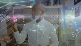 Animation of network of connections over financial data over diverse schoolchildren in warehouse. Global business connections data processing and technology concept digitally generated video. - Powered by Shutterstock - Get 15% off with code: PIKWIZARD15