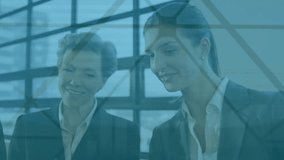 Animation of statistical data processing over diverse businesspeople discussing together at office. Business data technology concept - Powered by Shutterstock - Get 15% off with code: PIKWIZARD15