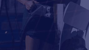 Animation of data processing over caucasian man charging electric car. Global electric car industry, ecology, digital interface, computing and data processing concept digitally generated video. - Powered by Shutterstock - Get 15% off with code: PIKWIZARD15