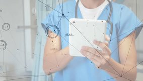 Animation of network of connections and data processing over caucasian male doctor using tablet. Global medicine and digital interface concept, digitally generated video. - Powered by Shutterstock - Get 15% off with code: PIKWIZARD15