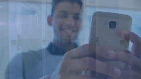 Animation of financial data processing over men using smartphone. global business, finances, data processing and digital interface concept digitally generated video. - Powered by Shutterstock - Get 15% off with code: PIKWIZARD15