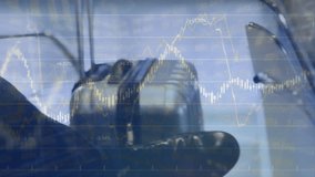 Animation of data processing over caucasian businessman reading newspaper. global business and digital interface concept digitally generated video. - Powered by Shutterstock - Get 15% off with code: PIKWIZARD15